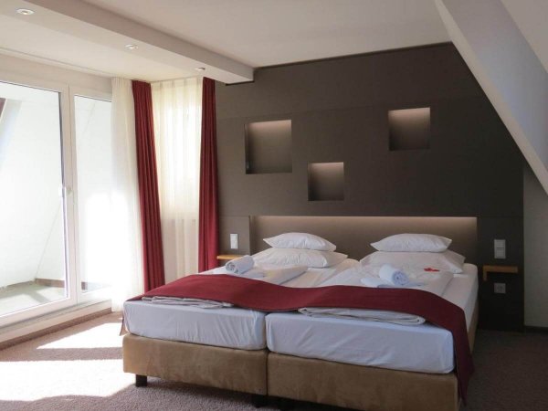 Doppelzimer mit Doppelbett im Hotel Neuthor